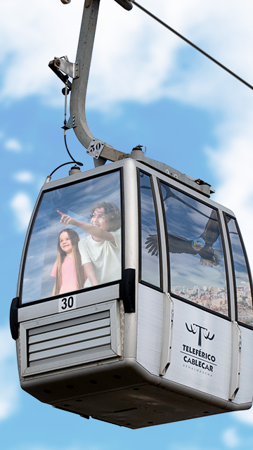 Children going up in the gondola lift of the Benalmádena Cablecar.